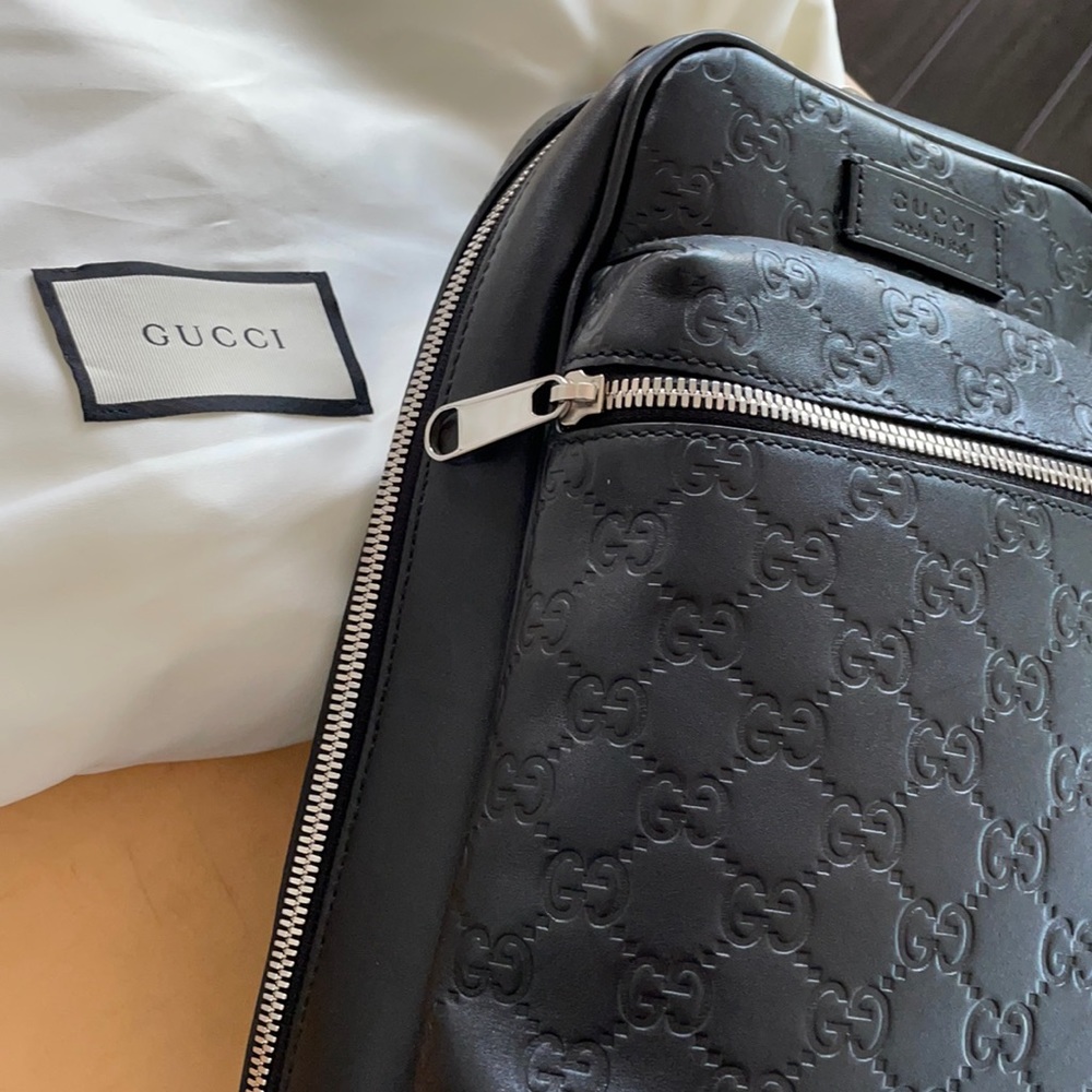Genuine Gucci leather sling bag